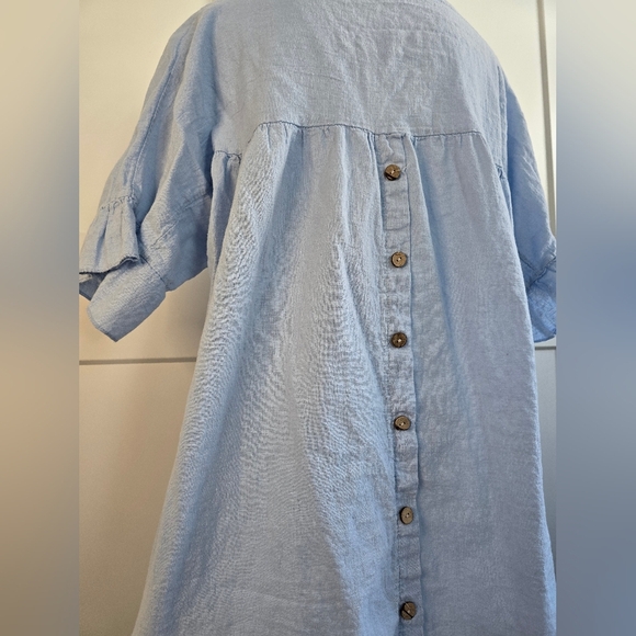 Light Blue Ruffle Hem Top With Button Detail Down The Black - Picture 7 of 10